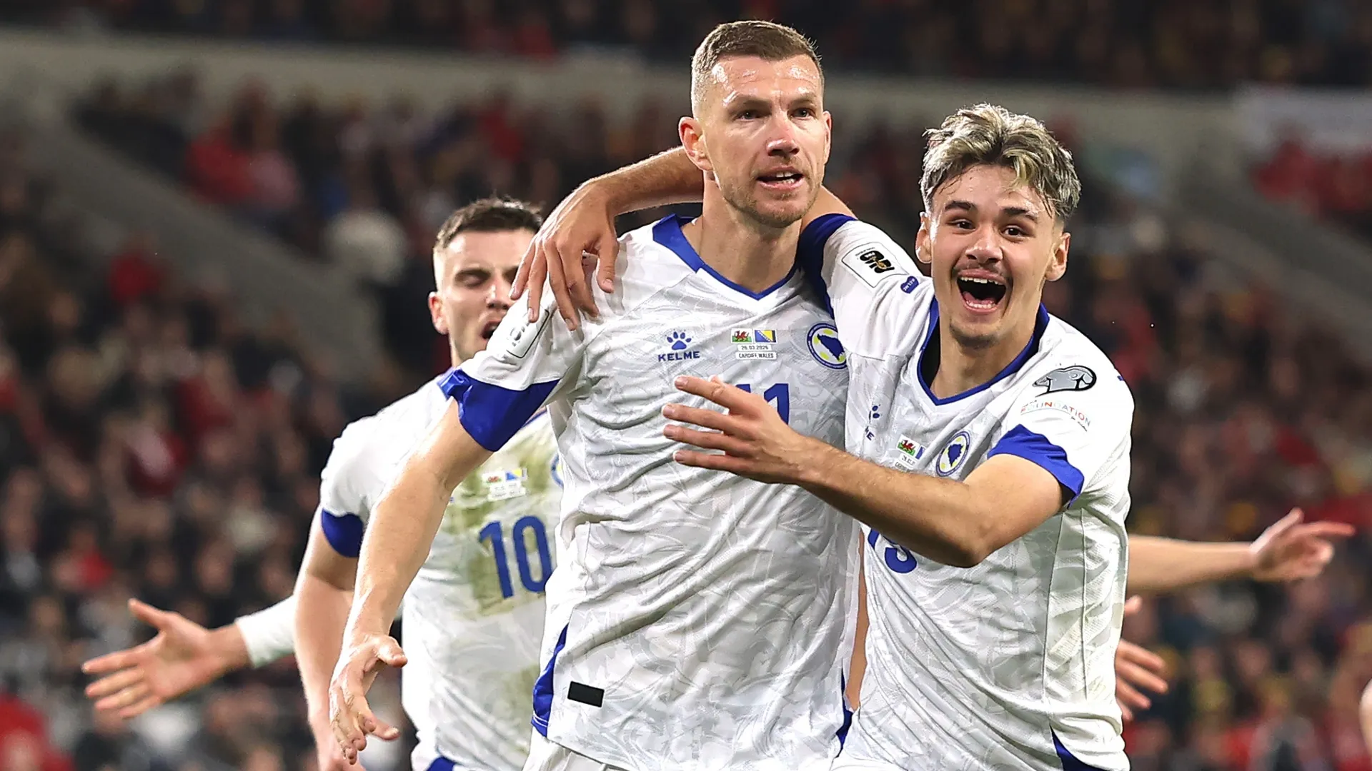 Edin Dzeko of Bosnia and Herzegovina celebrates with teammates – Warren Little/Getty Images