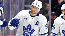 John Tavares #91 of the Maple Leafs celebrates with the bench.