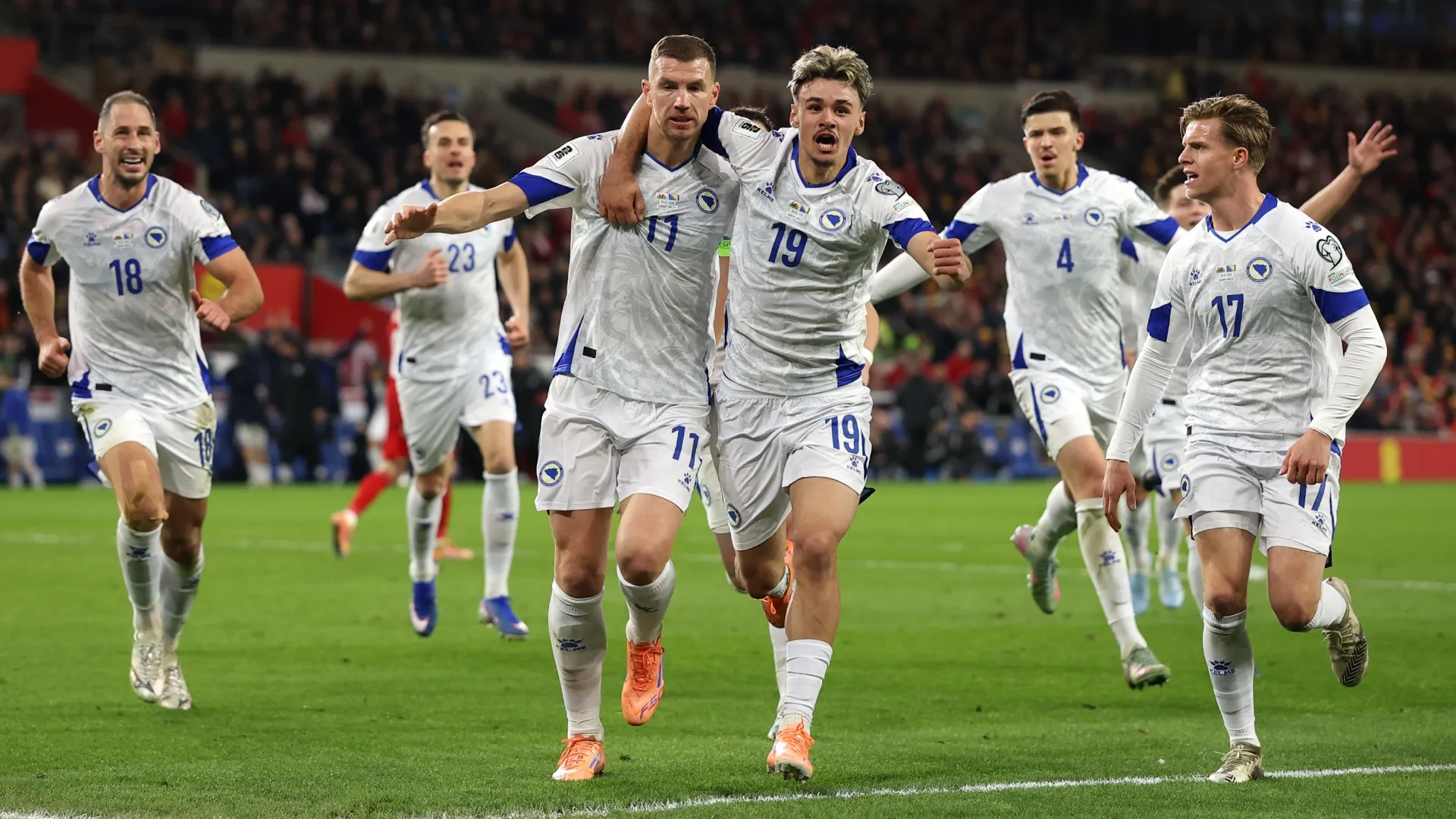Edin Dzeko of Bosnia and Herzegovina celebrates with teammates in 2026 (Source: Warren Little/Getty Images)