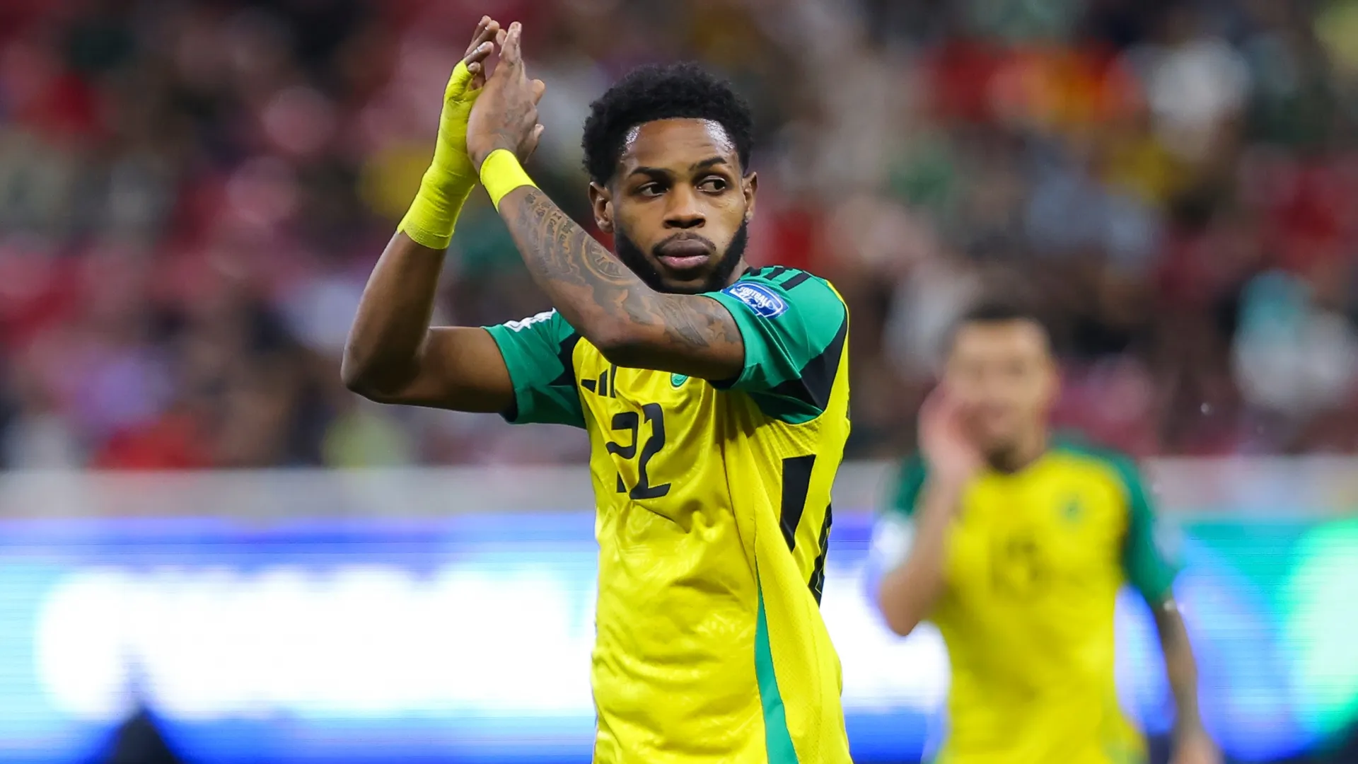 Ronaldo Webster of Jamaica claps during the FIFA World Cup 2026 Qualifying Playoff tournament match (Source: Agustin Cuevas/Getty Images)
