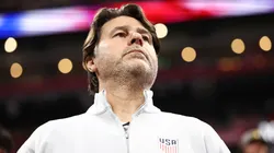 Mauricio Pochettino looks on.