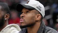 Giannis Antetokounmpo #34 of the Milwaukee Bucks sits on the bench.