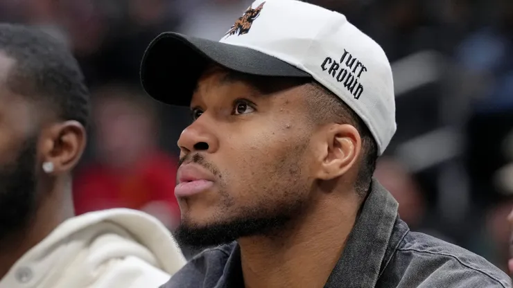 Giannis Antetokounmpo #34 of the Milwaukee Bucks sits on the bench.