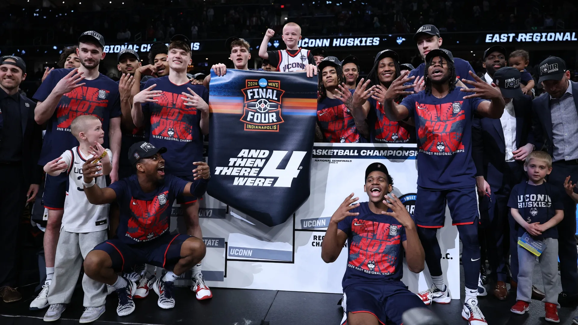 The UConn Huskies celebrate after defeating Duke in the Elite Eight of March Madness (Source: Emilee Chinn/Getty Images)