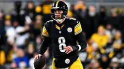 Aaron Rodgers scrambles in the fourth quarter of an NFL wild card playoff game in 2026.