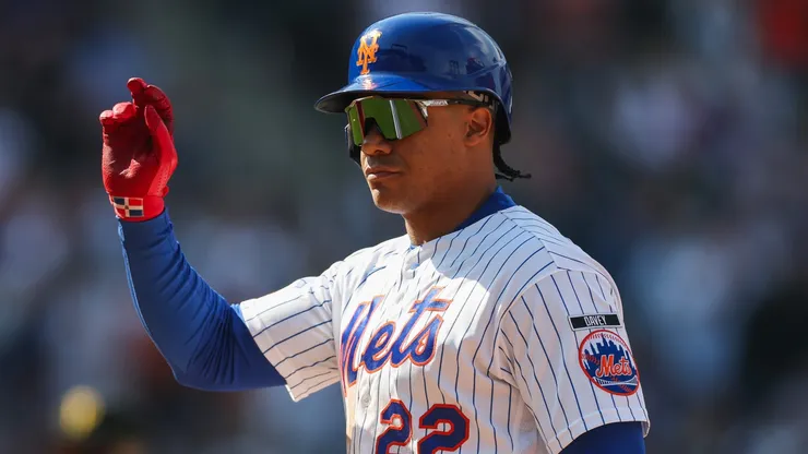 Juan Soto #22 of the New York Mets reacts to hitting a RBI.