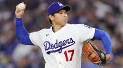 Shohei Ohtani #17 of the Dodgers throws during the first inning.