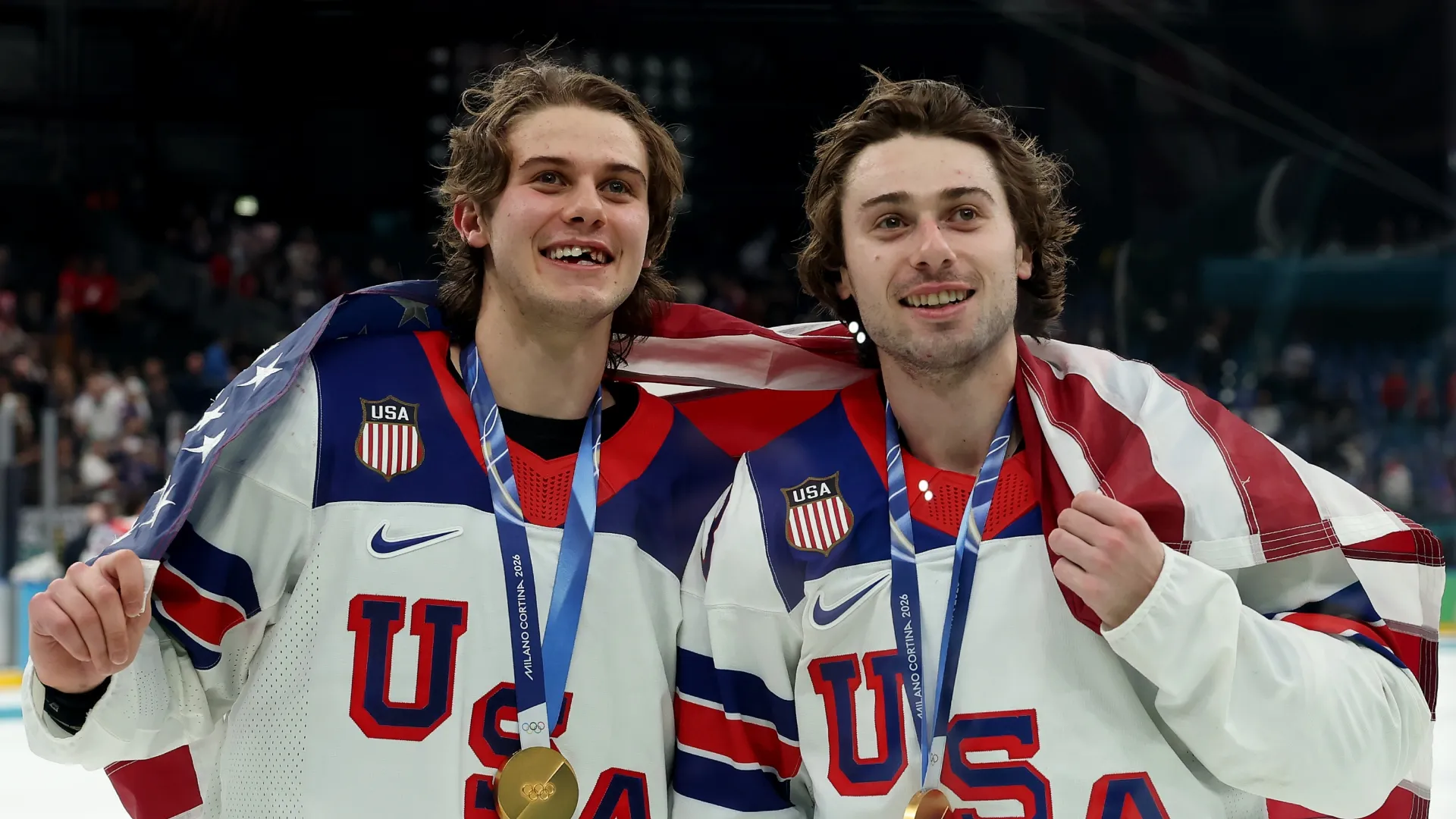 Jack (left) and Quinn Hughes (right) after winning gold