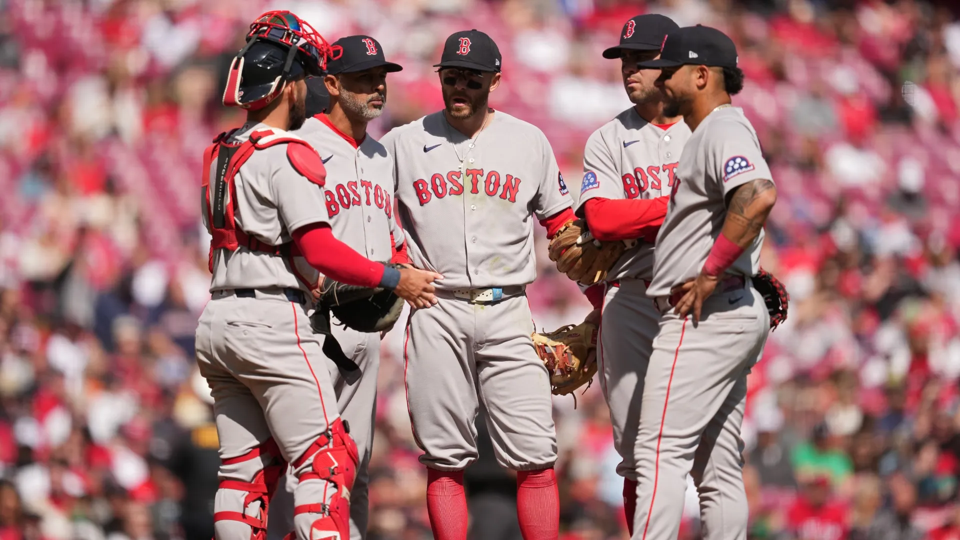 Boston Red Sox manager Alex Cora stands at the pitcher’s mound during a pitching change. Jeff Dean/Getty Images