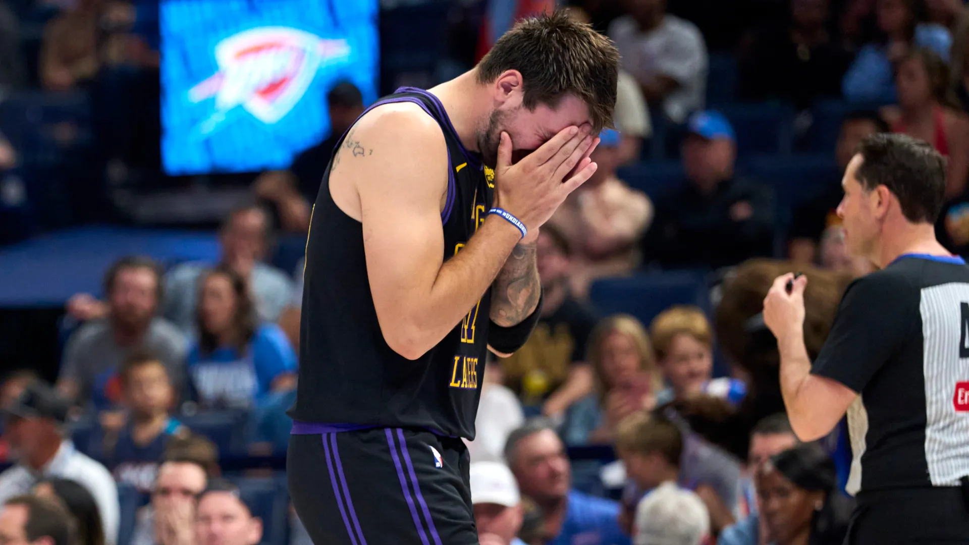 Luka Doncic reacts after getting injured. (Getty Images)