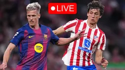 Dani Olmo of FC Barcelona is challenged by Robin Le Normand of Atletico Madrid.