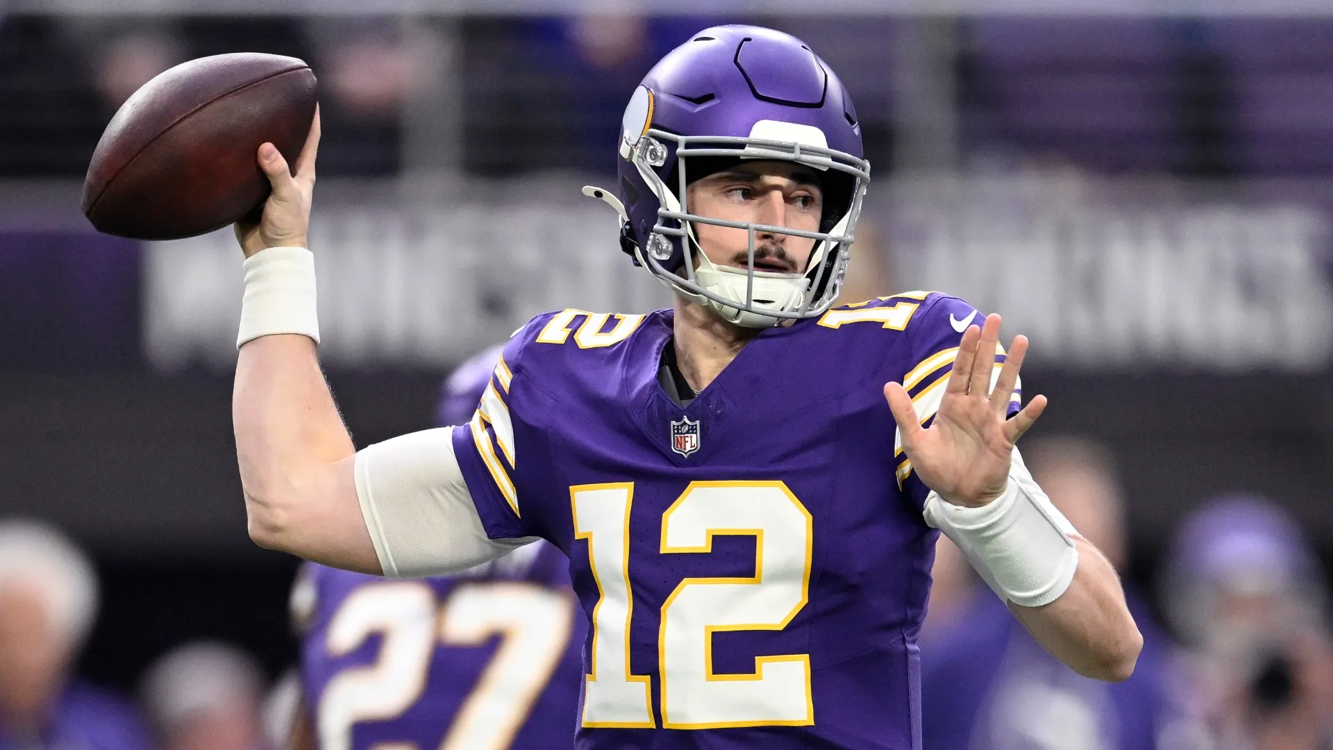 Max Brosmer #12 of the Minnesota Vikings throws a pass in 2026 (Source: Stephen Maturen/Getty Images)