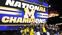 The Michigan Wolverines celebrate after defeating the UConn Huskies 69-63 in the National Championship