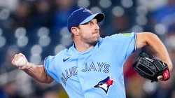 Max Scherzer #31 of the Blue Jays pitches to the Rockies.
