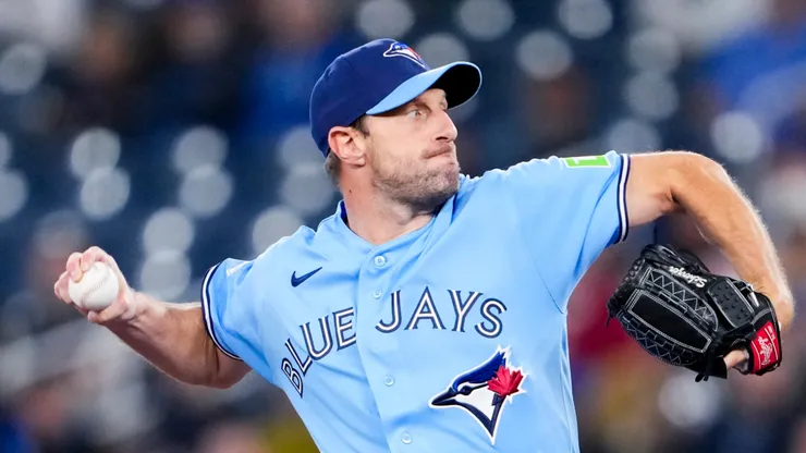 Max Scherzer #31 of the Blue Jays pitches to the Rockies.