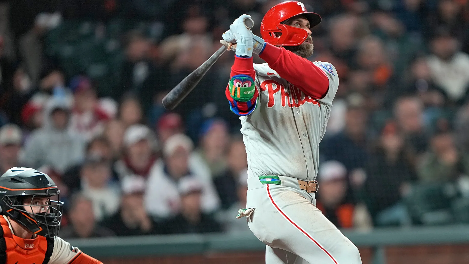Bryce Harper #3 of the Phillies drives in Justin Crawford with a double at Oracle Park. Thearon W. Henderson/Getty Images