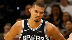 Victor Wembanyama #1 of the San Antonio Spurs talks.