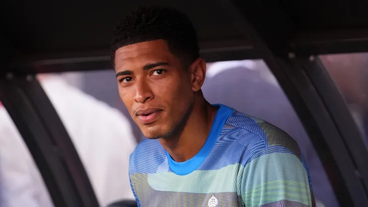 Jude Bellingham of Real Madrid looks on from the substitution bench.