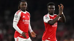 Eberechi Eze and Bukayo Saka of Arsenal show their appreciation to the fans in 2025.