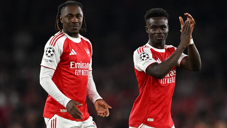 Eberechi Eze and Bukayo Saka of Arsenal show their appreciation to the fans in 2025.