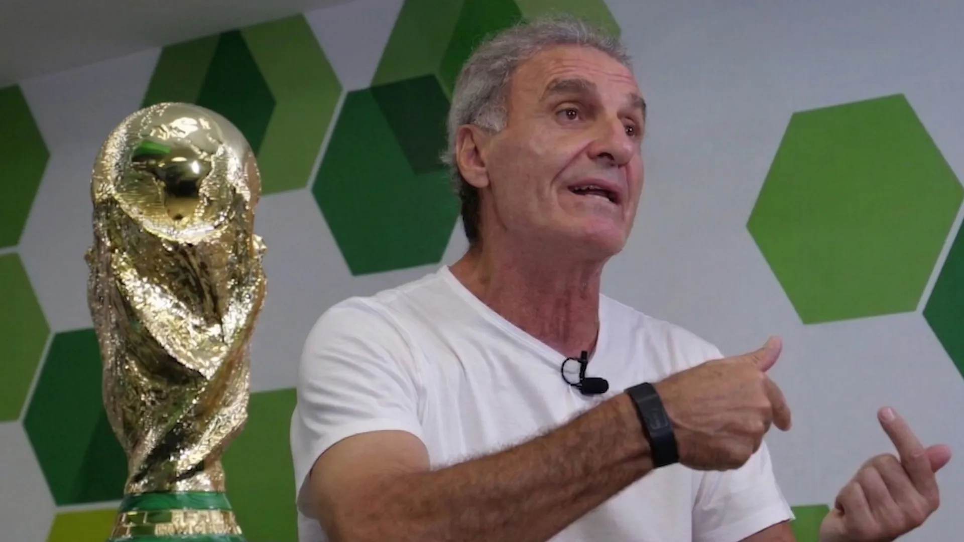 Ruggeri next to the World Cup as he speaks