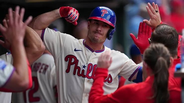J.T. Realmuto #10 of the Philadelphia Phillies celebrates with teammates.