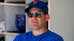 Carlos Mendoza #64 of the New York Mets looks on from the dugout.