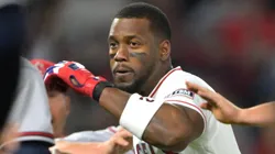 Benches clear as pitcher Reynaldo Lopez #40 of the Atlanta Braves and right fielder Jorge Soler #12.