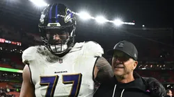 John Harbaugh and Daniel Faalele at Huntington Bank Field.