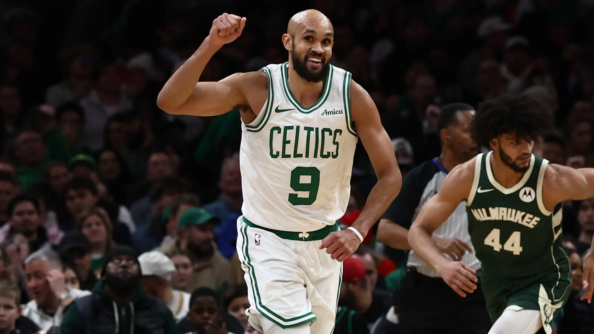 Derrick White #9 of the Boston Celtics celebrates after hitting a three point basket in 2026 (Source: Winslow Townson/Getty Images)