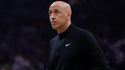 Head coach Doug Christie of the Sacramento Kings looks on.
