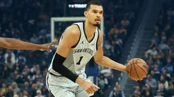 Victor Wembanyama dribbles the ball during their game against the Golden State Warriors in 2026.