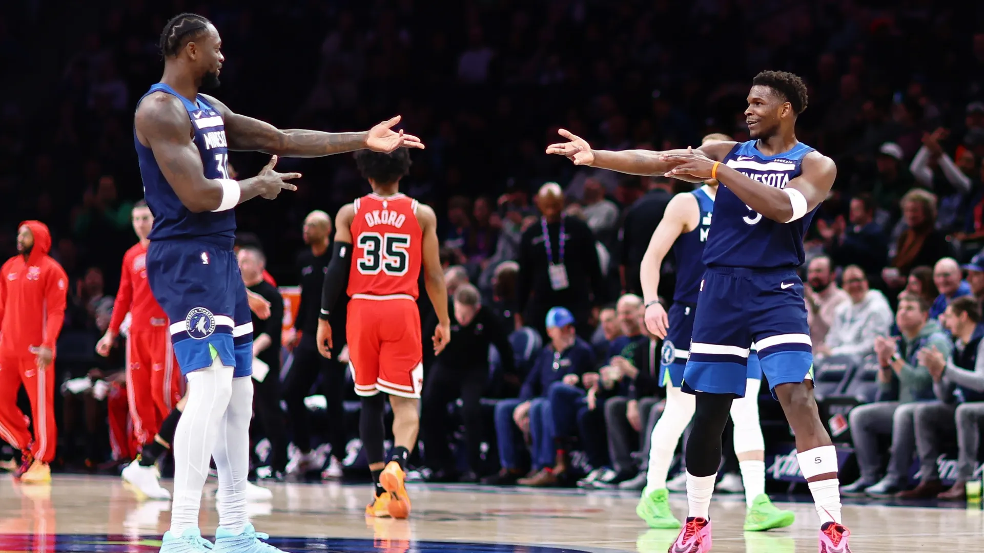 Anthony Edwards and Julius Randle react after a three point basket against the Chicago Bulls in 2026 (Source: Tyler Clouse/Getty Images)