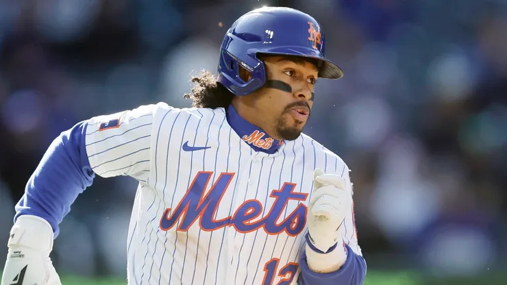 Francisco Lindor #12 of the New York Mets runs out.