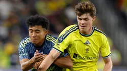 Matthew Corcoran of Nashville SC and Isaias Violante of Club America