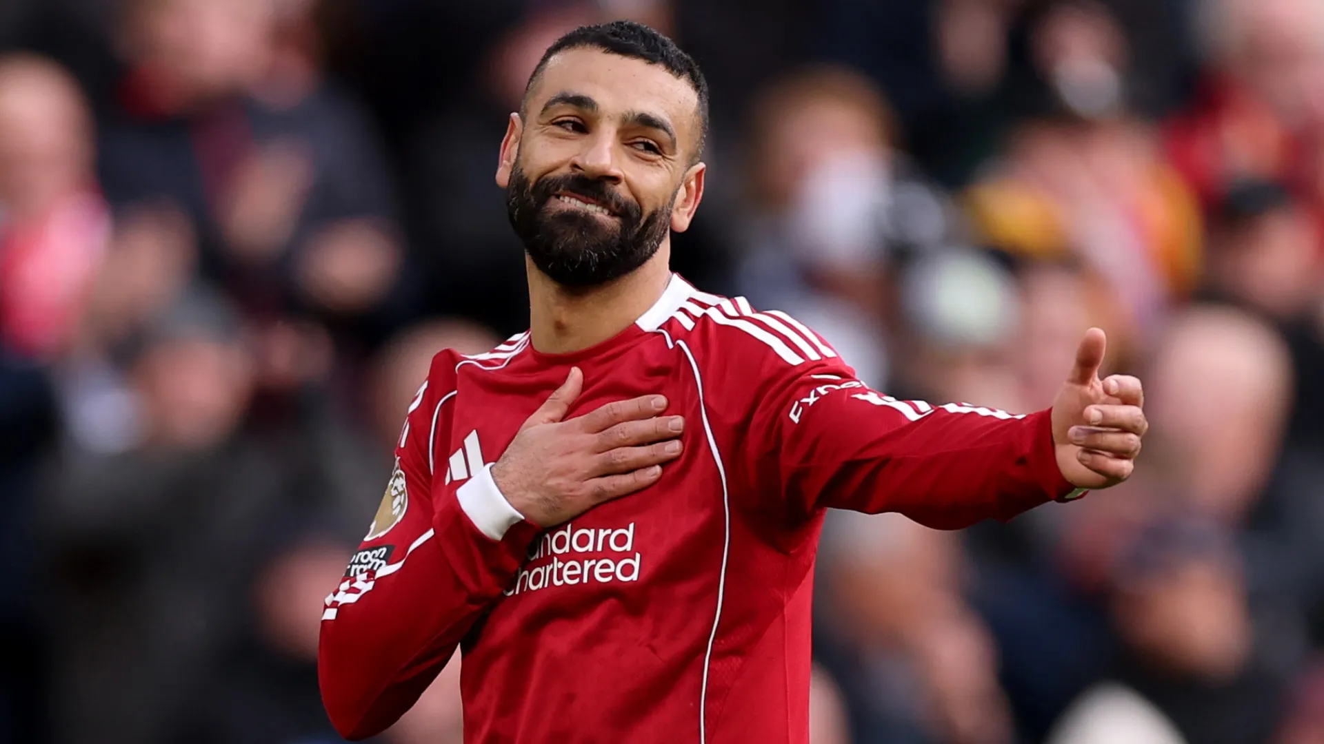Mohamed Salah celebrates scoring their second goal during the Premier League match (Source: Carl Recine/Getty Images)