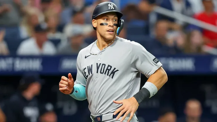 Aaron Judge #99 of the New York Yankees scores.