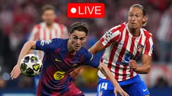 Gavi of FC Barcelona is challenged by Marcos Llorente of Atletico de Madrid.