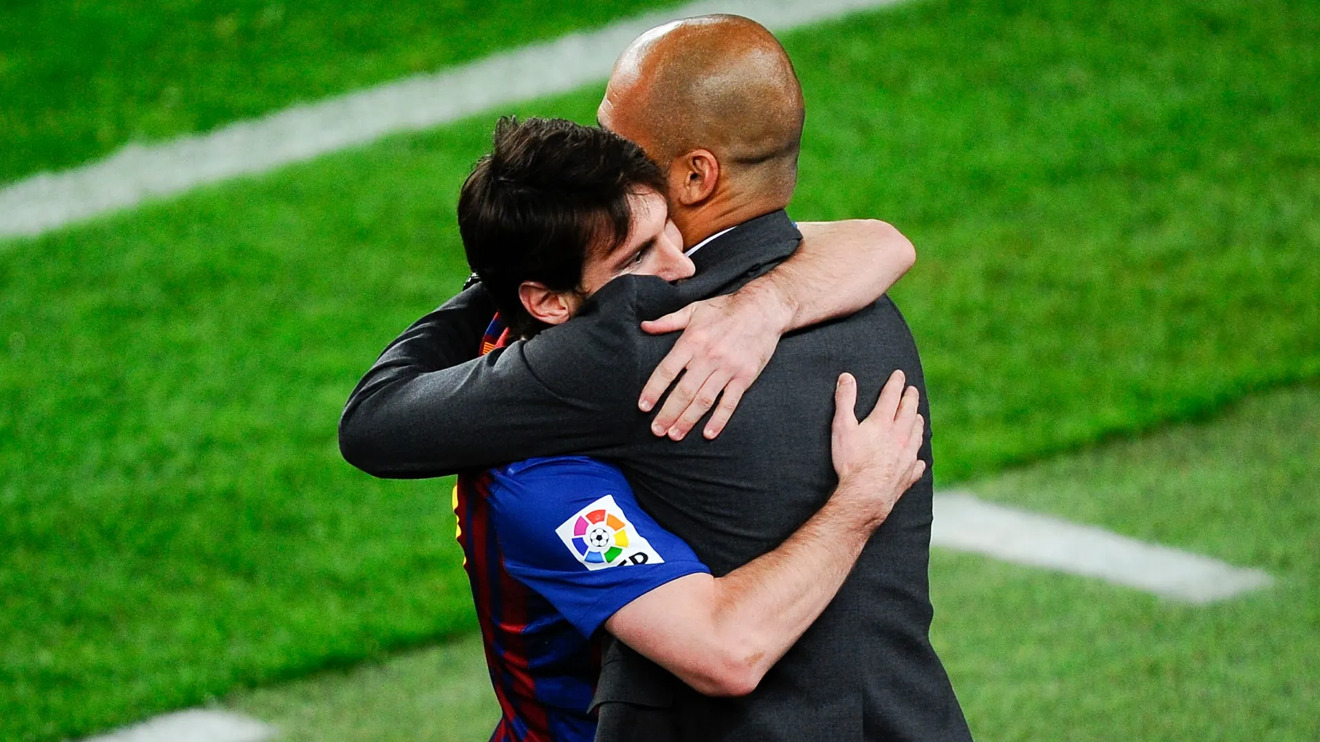 Lionel Messi with Pep Guardiola