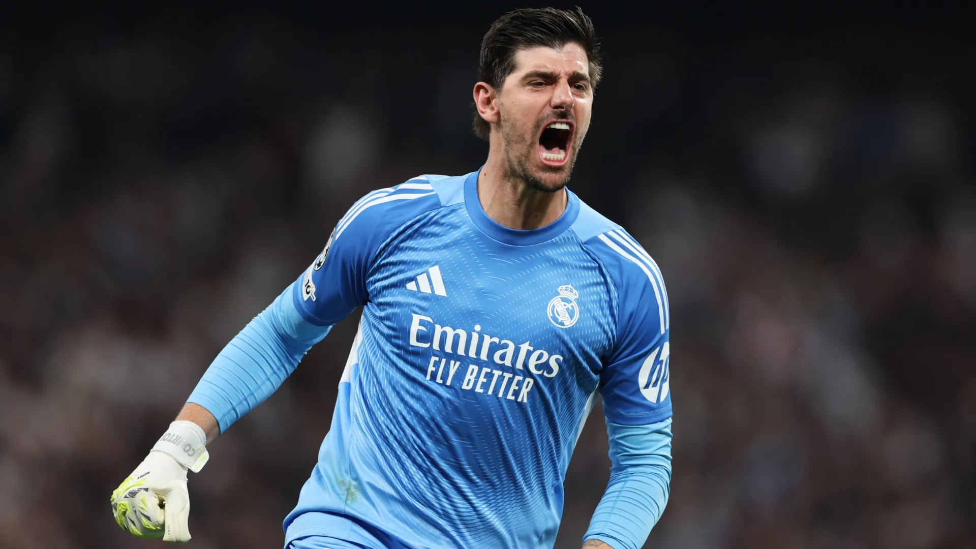 Thibaut Courtois of Real Madrid celebrates after their sides third goal by Federico Valverde (Source: Florencia Tan Jun/Getty Images)