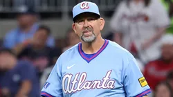 Manager Walt Weiss #22 of the Atlanta Braves walks out to the mound.