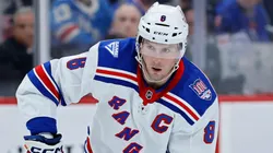J.T. Miller #8 of the New York Rangers controls the puck.