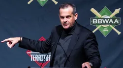 Aaron Boone introduces Carlos Rodon during the Baseball Writers of America Awards Dinner.