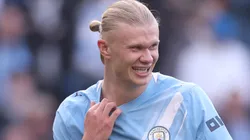 Erling Haaland interacts as Manchester City celebrate.