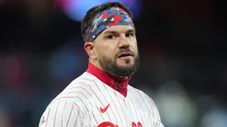 Kyle Schwarber #12 of the Philadelphia Phillies looks on.