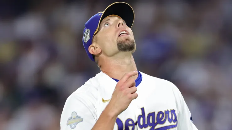 Blake Treinen #49 of the Los Angeles Dodgers reacts after pitching.