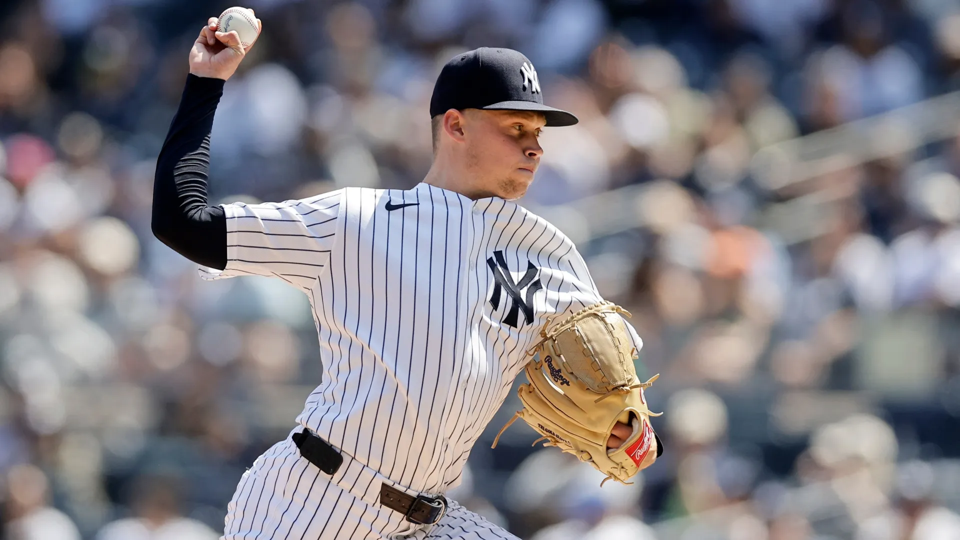 Will Warren #29 of the Yankees pitches during the first inning against the Royals. Jim McIsaac/Getty Images