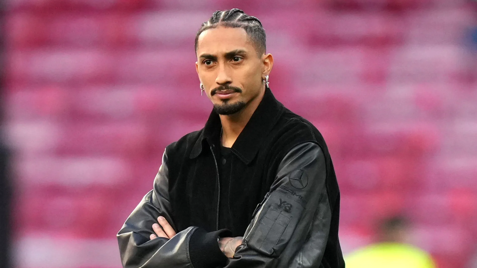 Raphinha inspects the pitch prior to the UEFA Champions League 2025/26 Quarter-Final Second Leg match (Source: Angel Martinez/Getty Images)