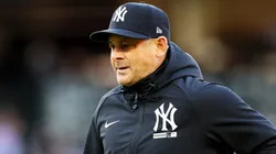 Manager Aaron Boone #17 of the New York Yankees heads to the dugout.