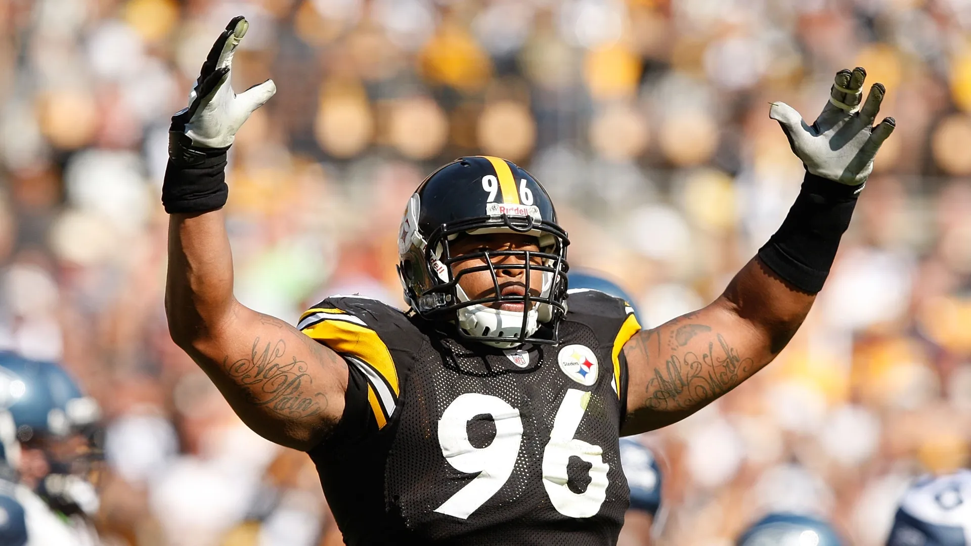 Ziggy Hood motions to the crowd during a Steelers game.